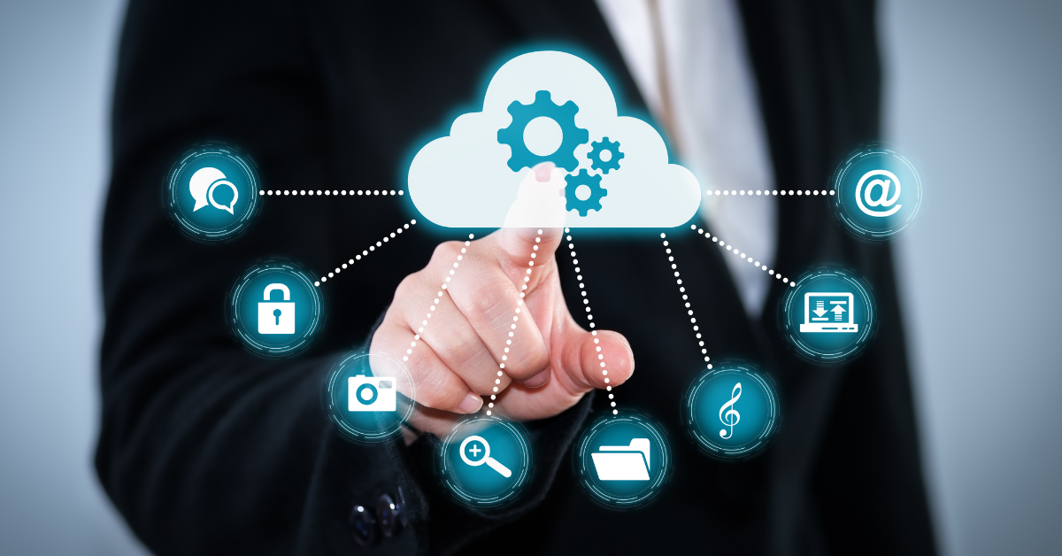Finger pointing on the screen where there is a picture of cloud and its services