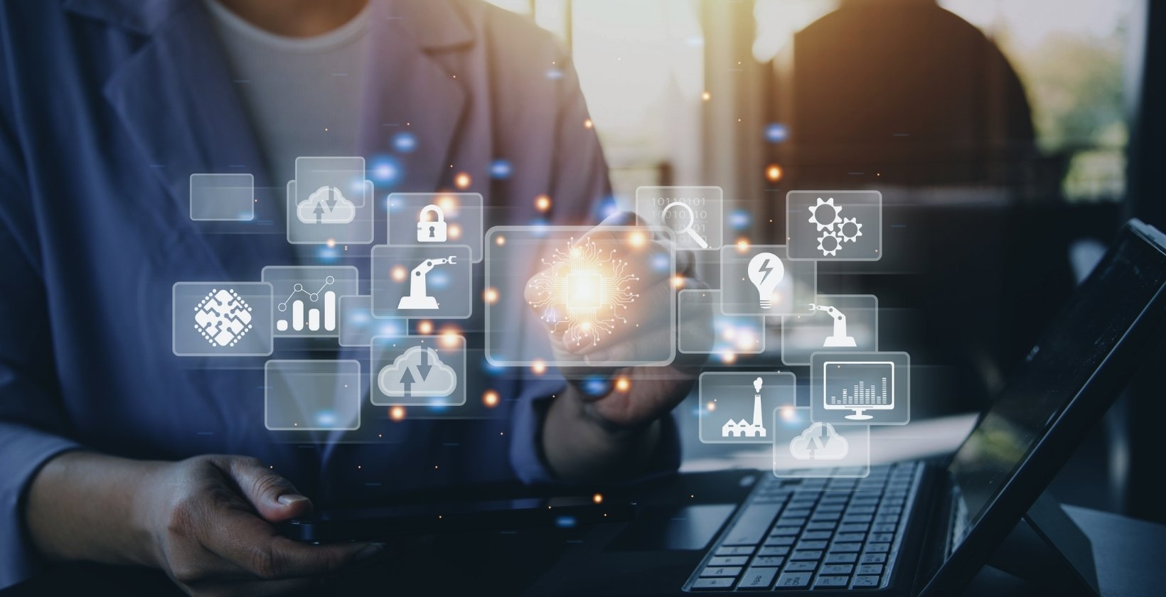 a human hand and a robot hand doing handshake